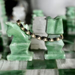 FAIRY BRACELET REGINA PEONIAYellow gold 9kt gr 11Black diamonds Ct 0,64Enamel Euro 3650,00