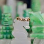 FAIRY RING REGINA FIOR DI PESCOYellow gold 9k gr 3,41Brown diamonds CT. 0,24Enamel Euro 1350,00